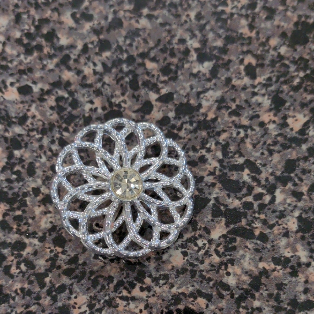 Elegant Silver Floral Brooch